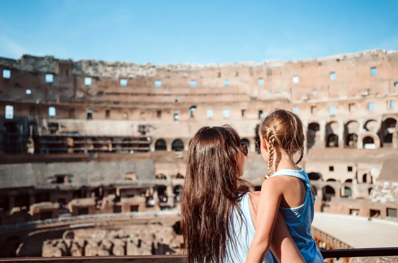 Mother and daughter inside the Roman Colosseum