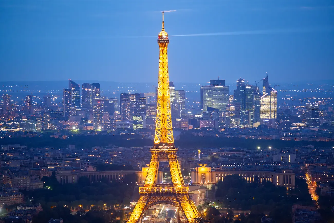 skyline of paris with eiffel tower at night