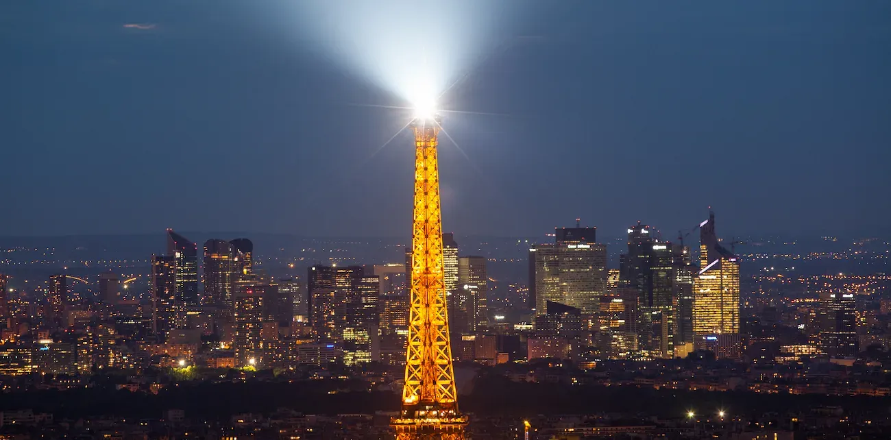 skyline of paris with eiffel tower at sunset