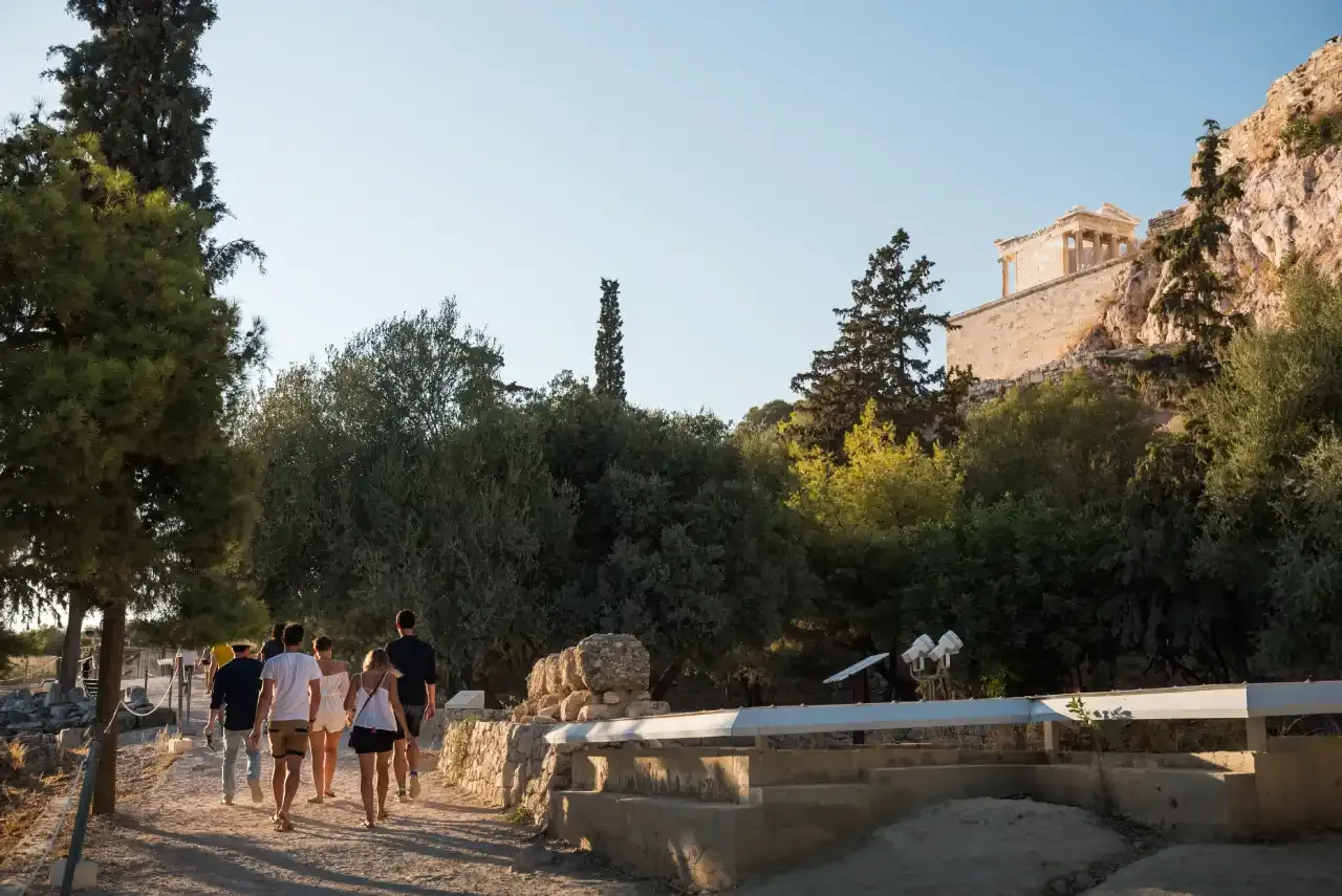 Tourists walking up to the Acropolis