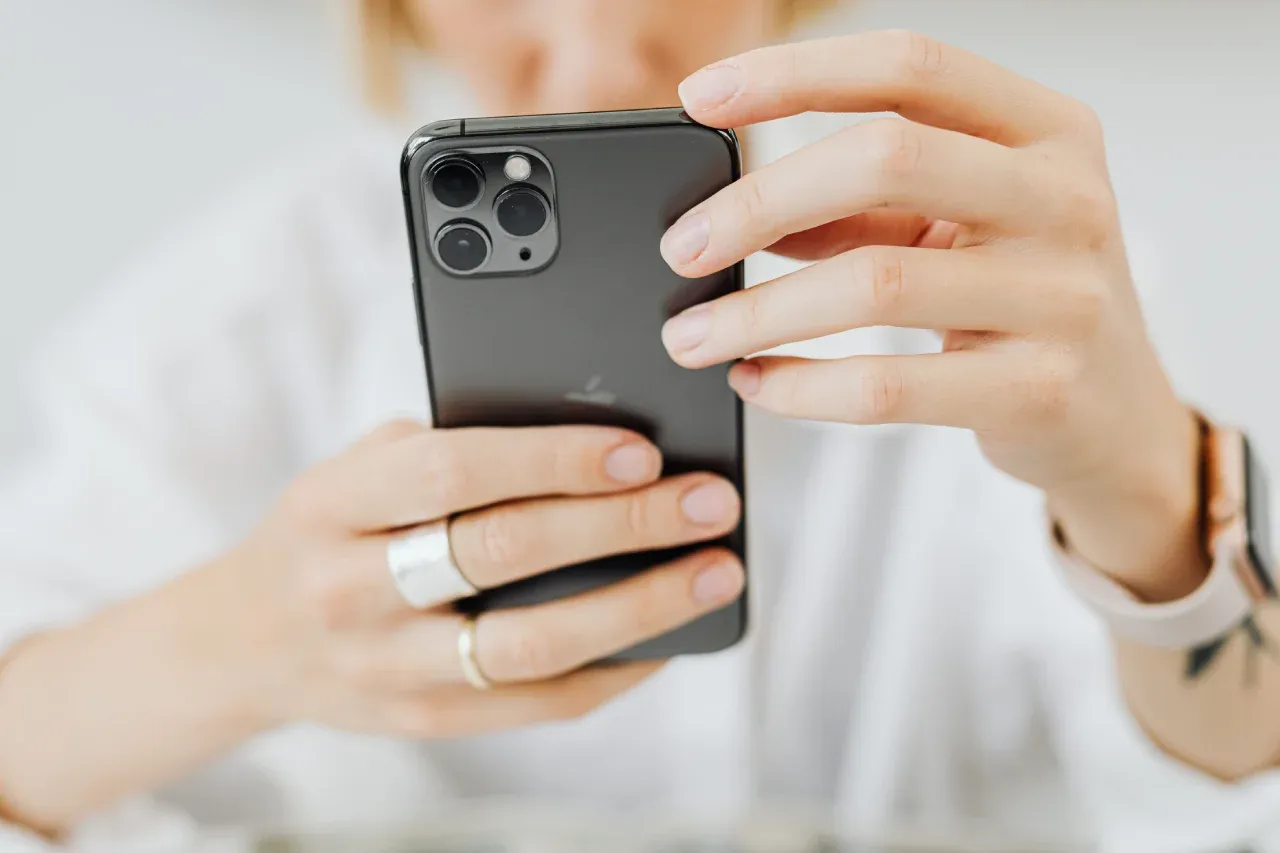 Woman holding a cell phone