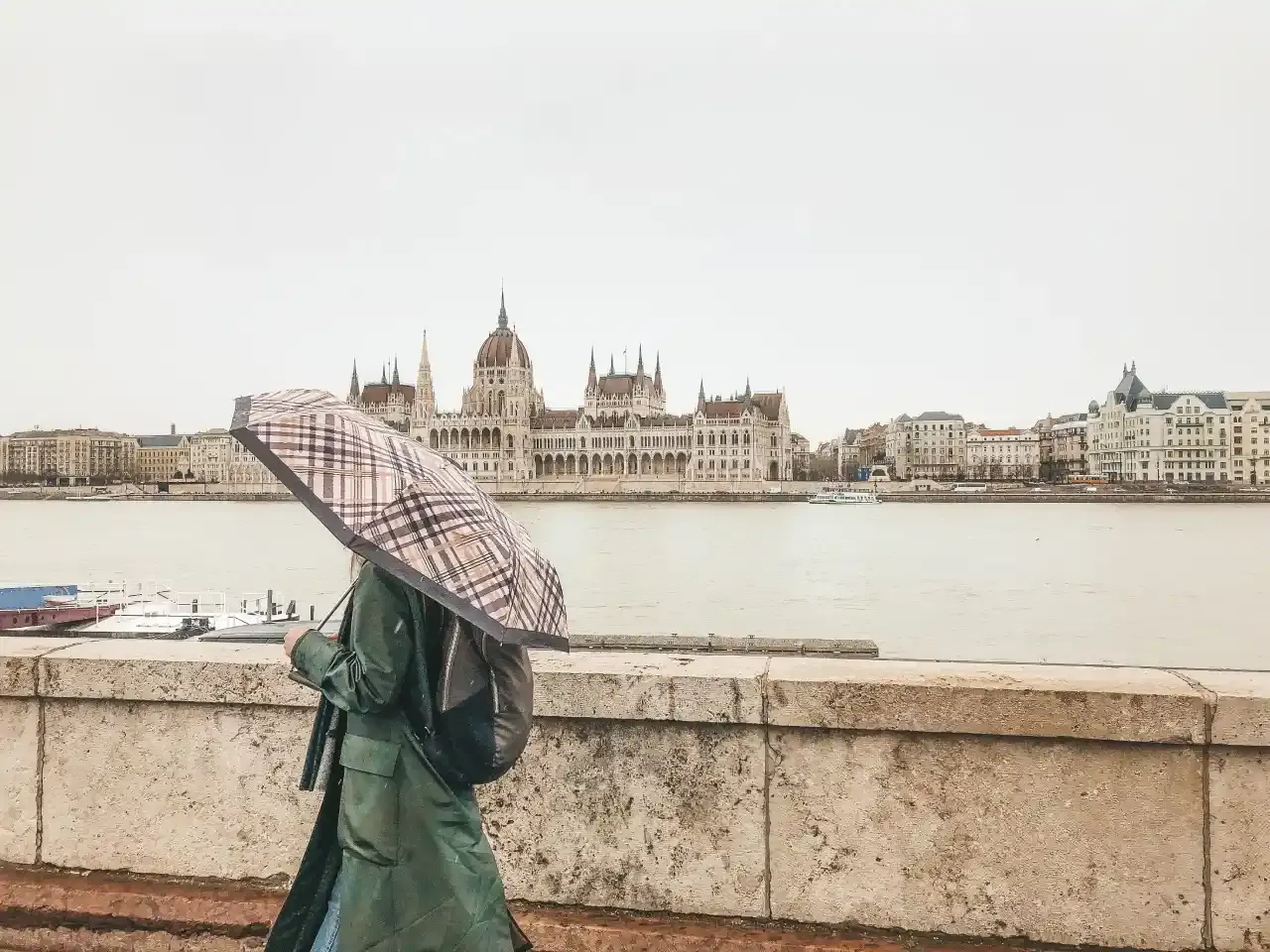 Woman walking near the Hungarian Parliament Building