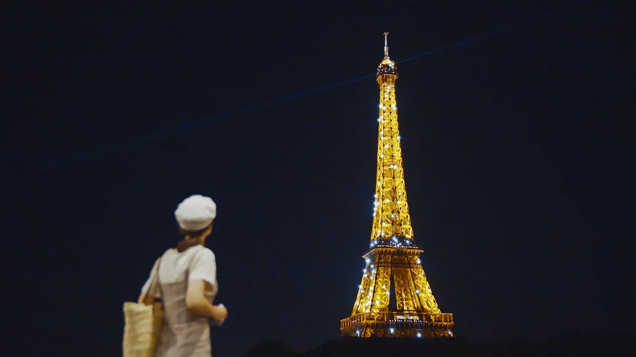 Young tourist at the Eiffel Tower in Paris